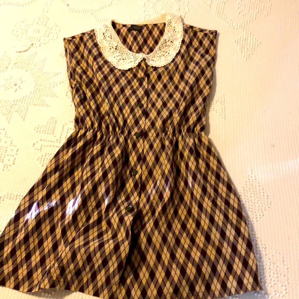 Tan, black dress with lace collar
